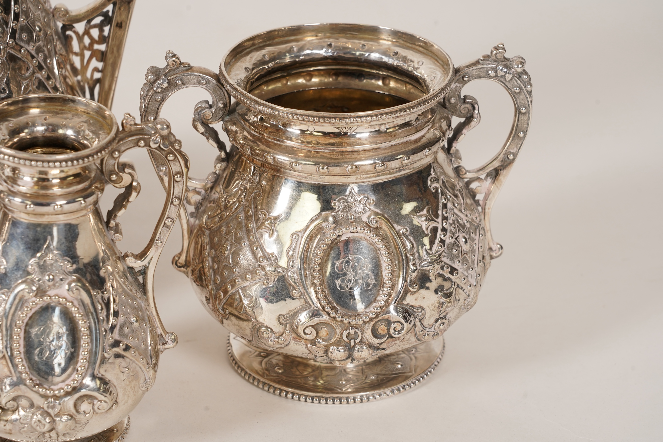 A Victorian ornate silver four piece tea and coffee service, by Thomas Smily